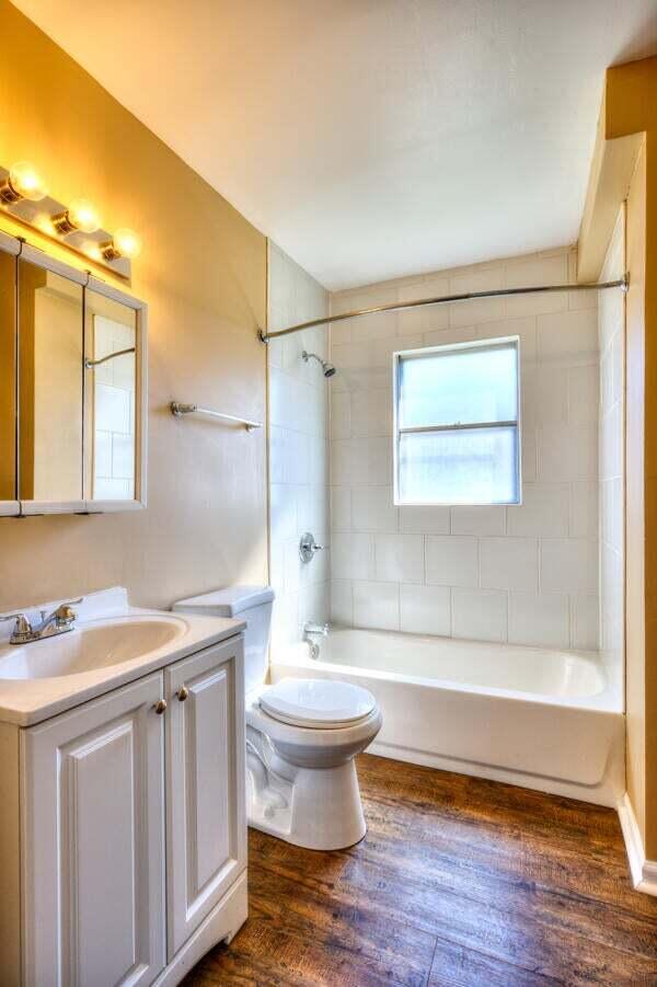 3701 Monroe Street Gary, IN 46408 - Photo 11 of 22 a bathroom with a sink toilet vanity and shower