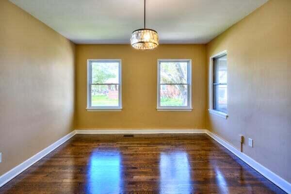 3701 Monroe Street Gary, IN 46408 - Photo 7 of 22 a view of room with window and wooden floor