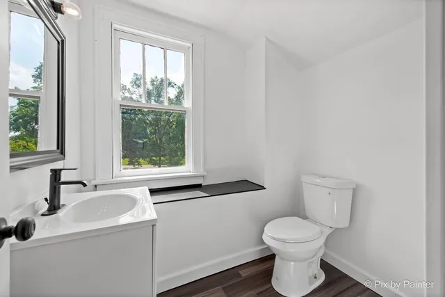 a bathroom with a sink and a toilet