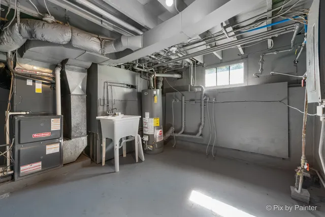 a view of a room with lots of chairs and chandelier