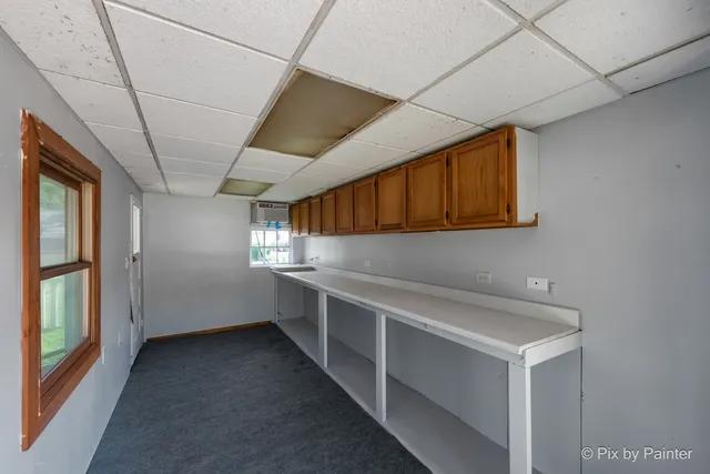 a view of storage and utility room