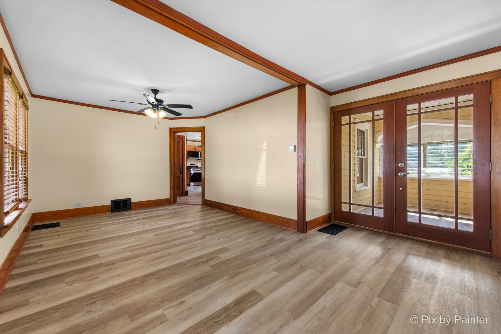 503 North River Road Fox River Grove, IL 60021 - Photo 4 of 48 an empty room with wooden floor and windows