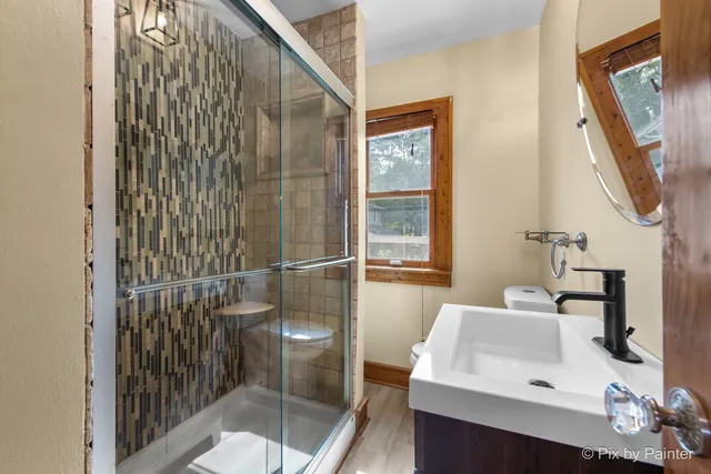a bathroom with a sink and mirror