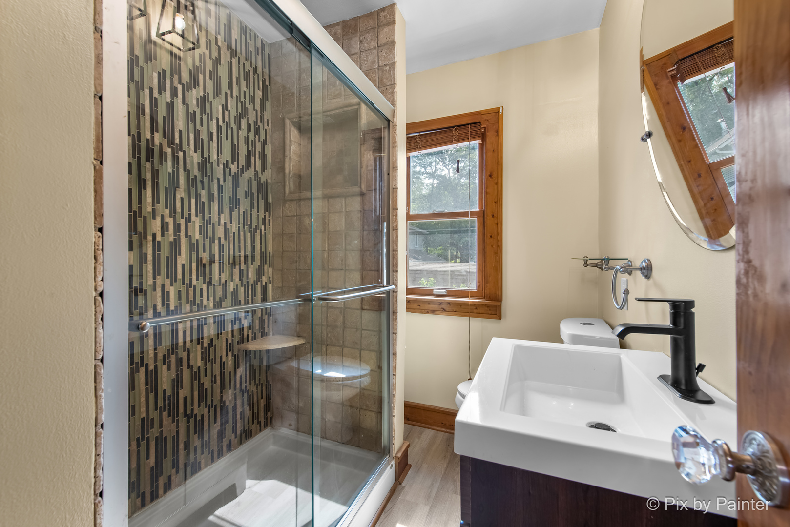 503 North River Road Fox River Grove, IL 60021 - Photo 10 of 48 a bathroom with a sink and mirror