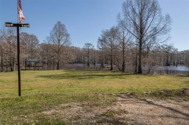 a view of a yard with a house