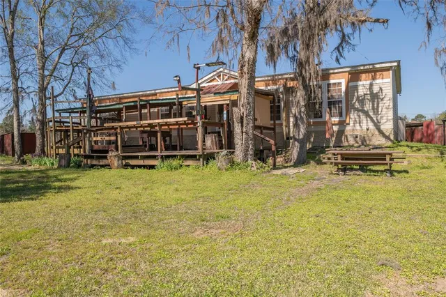 a view of a house with a swimming pool