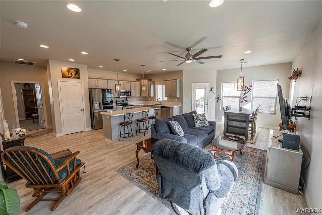 3566 North Kenneth Road Kingman, AZ 86409 - Photo 8 of 35 a living room with furniture and kitchen view