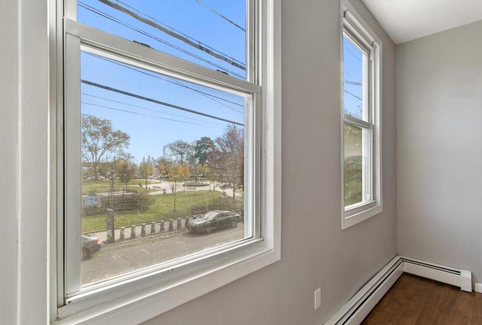 475 Palisade Avenue, Unit 4 Jersey City, NJ 07307 - Photo 7 of 16 a view of a glass door with a view of room