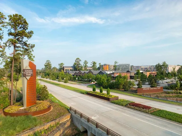 a view of a street with an outdoor space