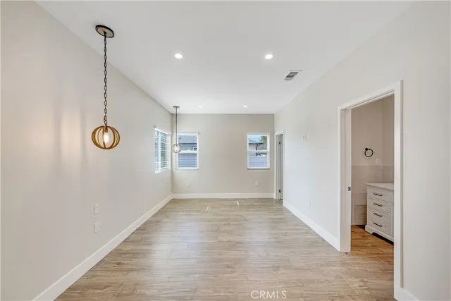a view of an empty room and window