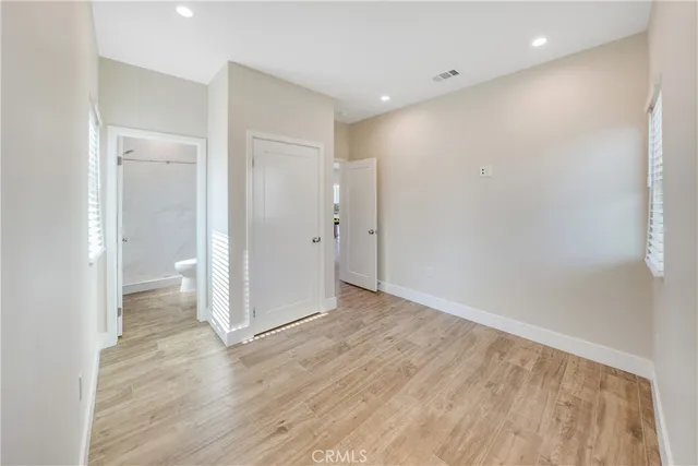 a view of a livingroom with wooden floor