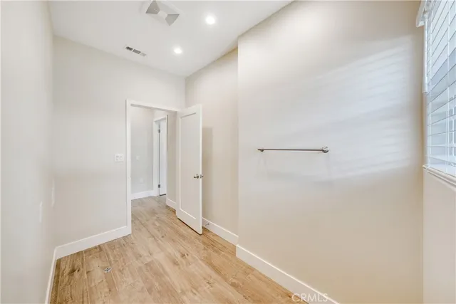 a view of a house with backyard and deck