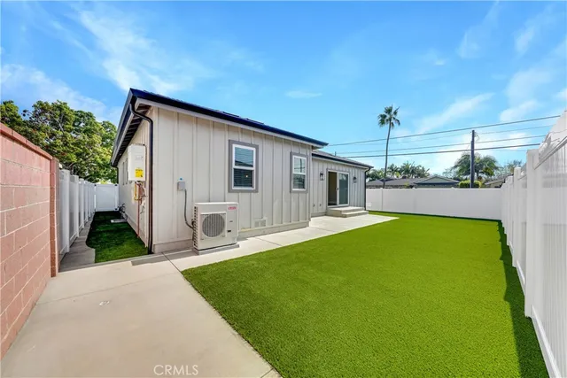 a front view of a house with a garage