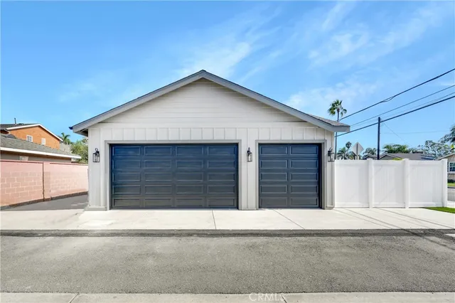 a view of a house with a street