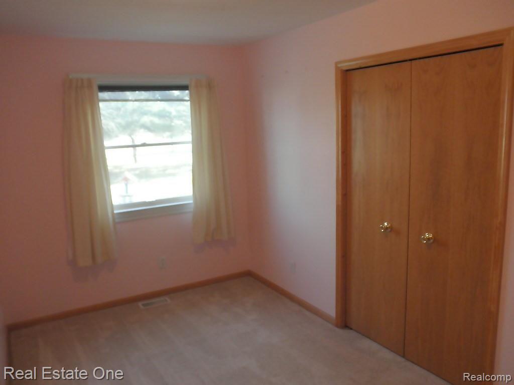 1452 South Crawford Road Deford, MI 48729 - Photo 19 of 49 Bedroom 2, closet view.JPG