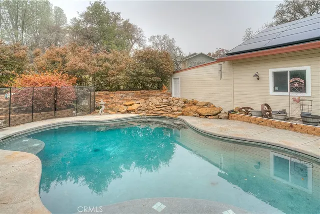 a view of a swimming pool with an outdoor space