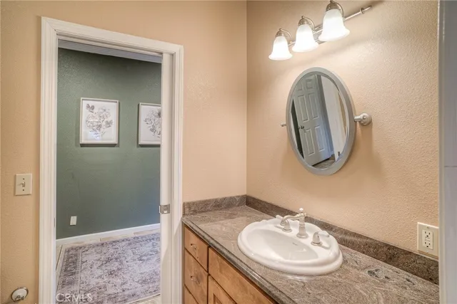 a view of a hallway with entryway door