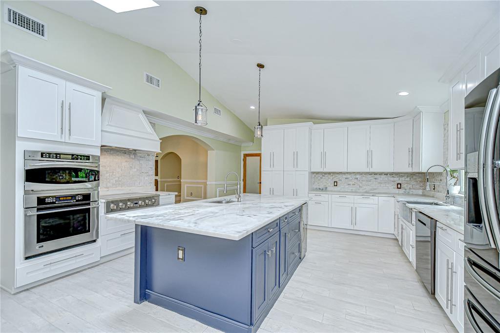 1931 Jaudon Road Dover, FL 33527 - Photo 15 of 50 a kitchen with a sink stove and oven