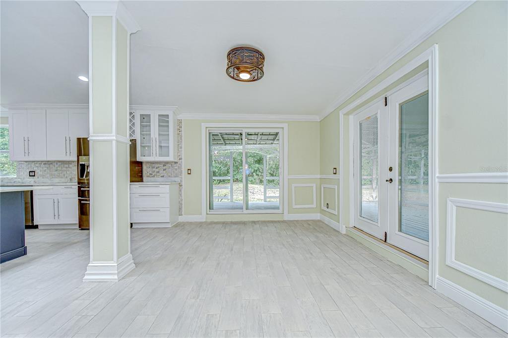 1931 Jaudon Road Dover, FL 33527 - Photo 22 of 50 a view of kitchen with refrigerator and window