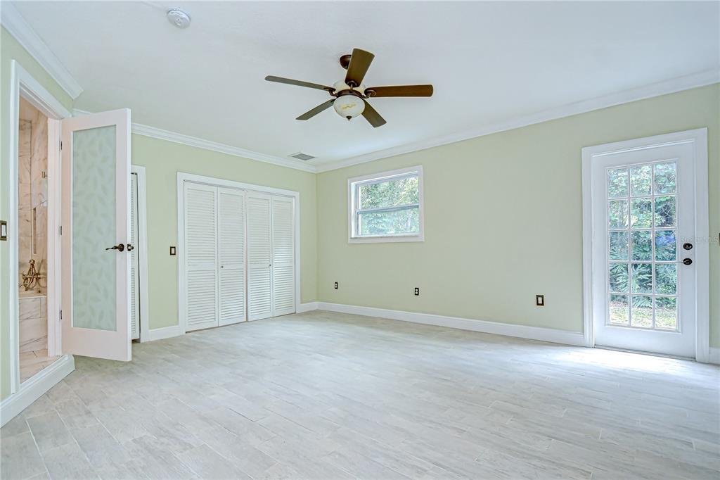 1931 Jaudon Road Dover, FL 33527 - Photo 23 of 50 a view of empty room with ceiling fan