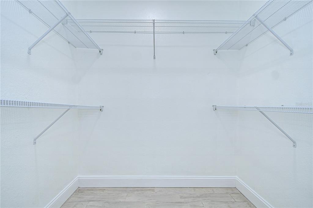 1931 Jaudon Road Dover, FL 33527 - Photo 27 of 50 a view of a room with racks on the wall