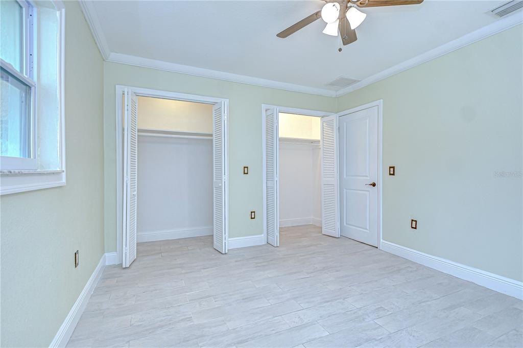 1931 Jaudon Road Dover, FL 33527 - Photo 29 of 50 an empty room with chandelier fan