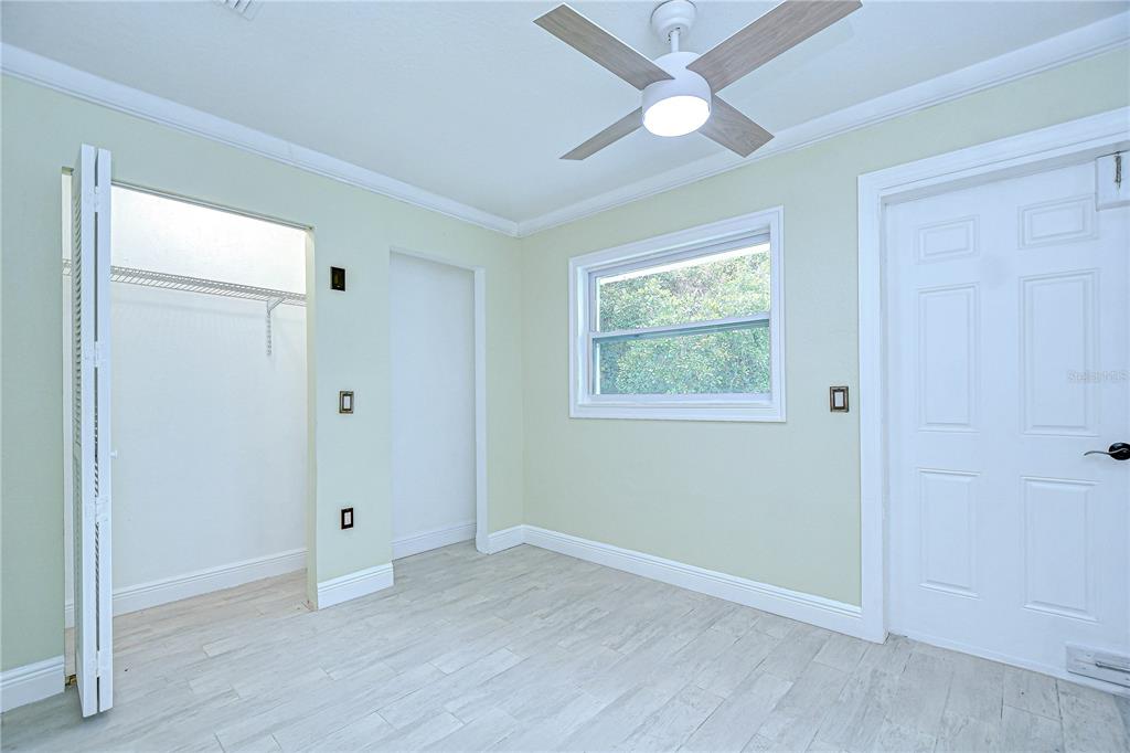 1931 Jaudon Road Dover, FL 33527 - Photo 34 of 50 an empty room with fan and windows