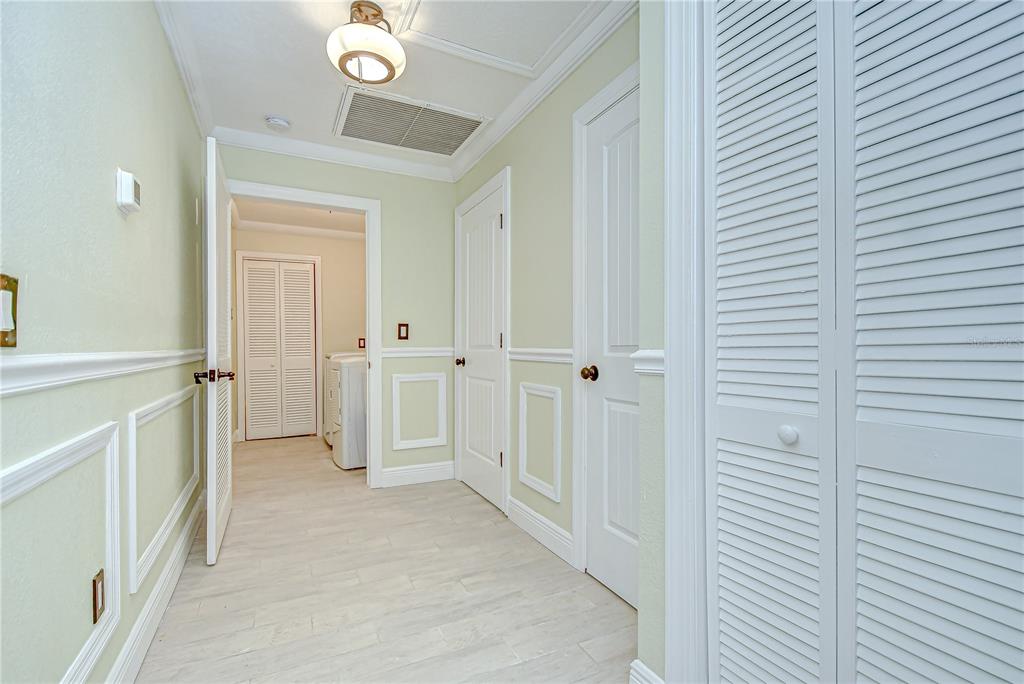 1931 Jaudon Road Dover, FL 33527 - Photo 35 of 50 a view of a hallway with closet and chandelier