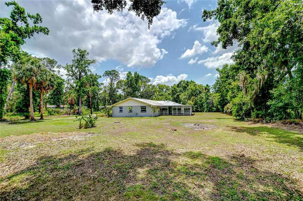1931 Jaudon Road Dover, FL 33527 - Photo 42 of 50 a view of a backyard with swimming pool