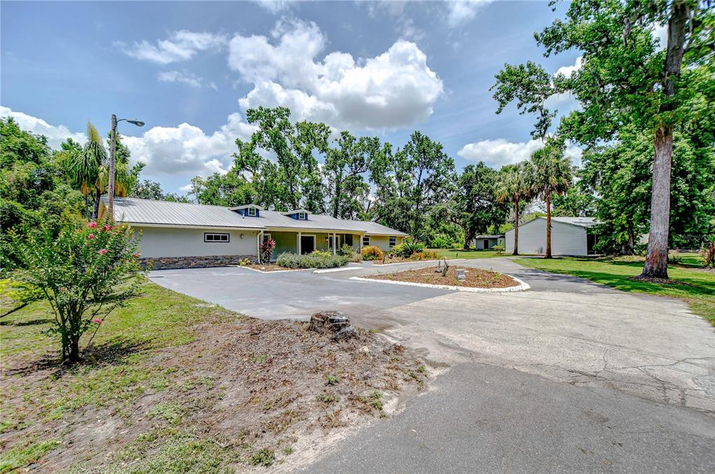 1931 Jaudon Road Dover, FL 33527 - Photo 47 of 50 a view of a house with a yard