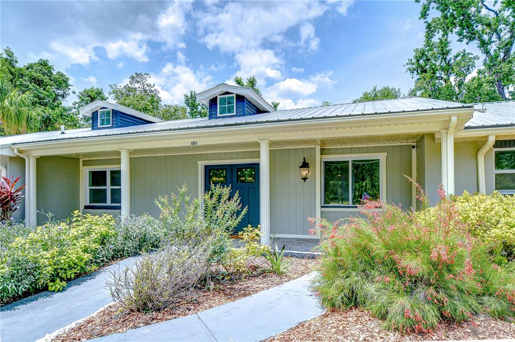 1931 Jaudon Road Dover, FL 33527 - Photo 49 of 50 front view of a house with potted plants