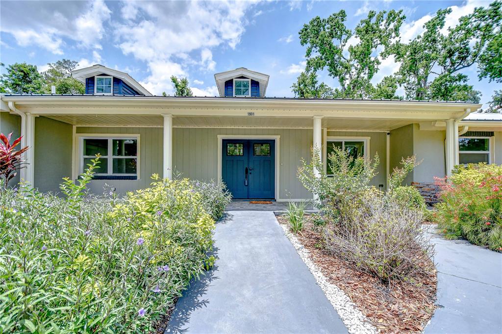 1931 Jaudon Road Dover, FL 33527 - Photo 7 of 50 front view of house with potted plants