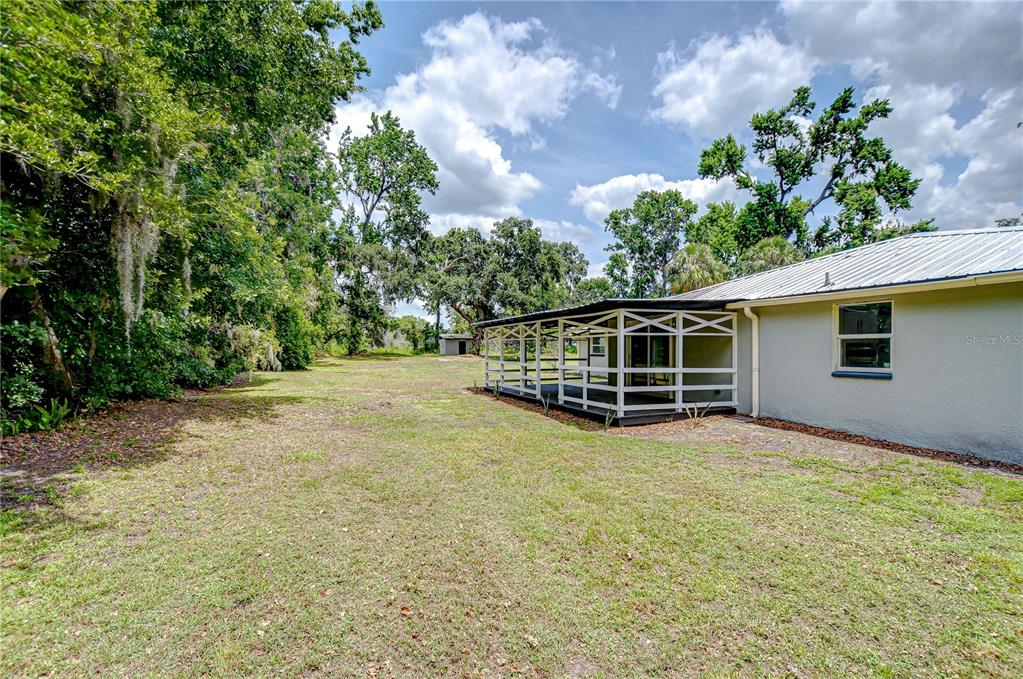 1931 Jaudon Road Dover, FL 33527 - Photo 8 of 50 a view of a house with a yard