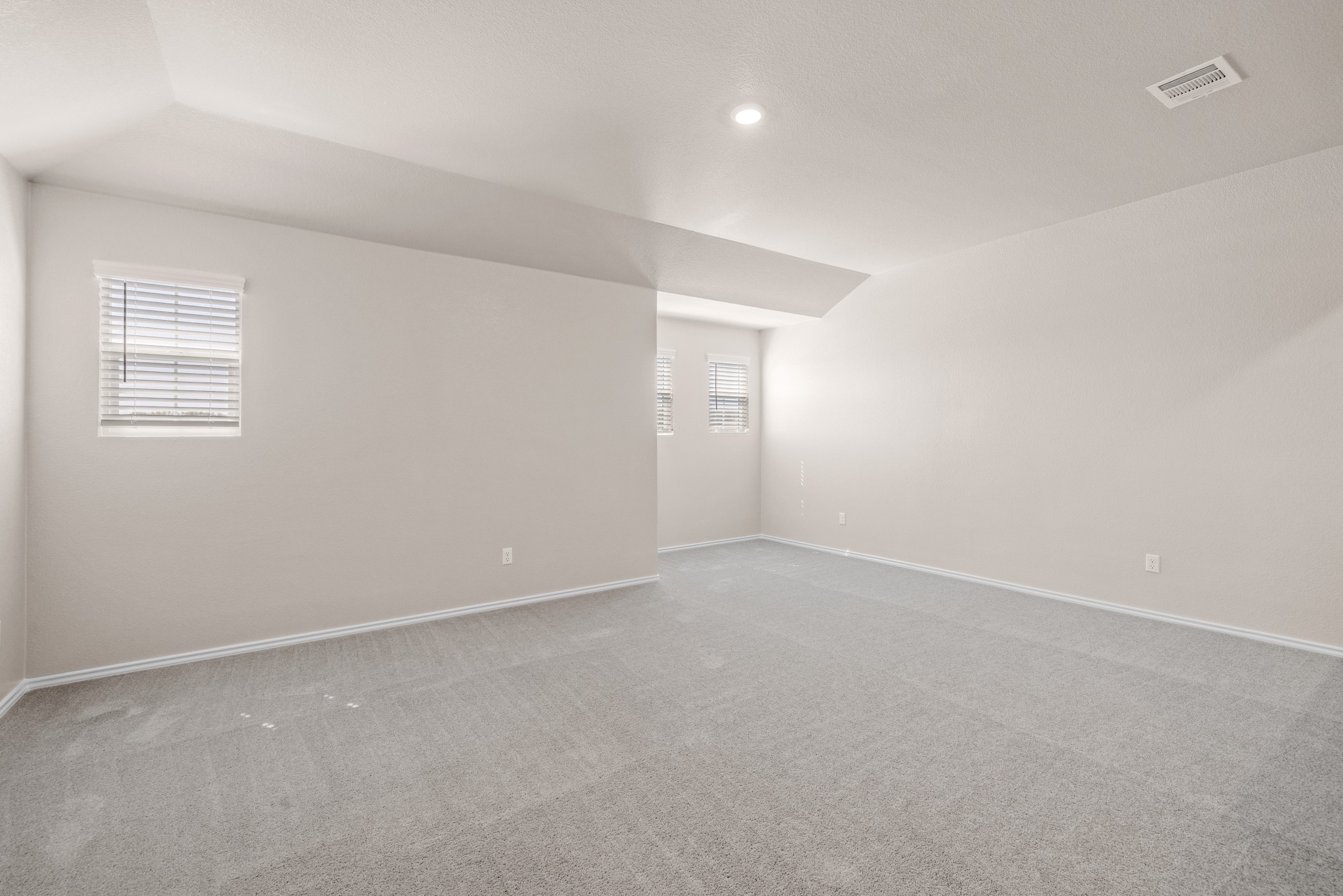 2309 Four Waters Loop Georgetown, TX 78628 - Photo 21 of 40 Carpeted empty room with plenty of natural light