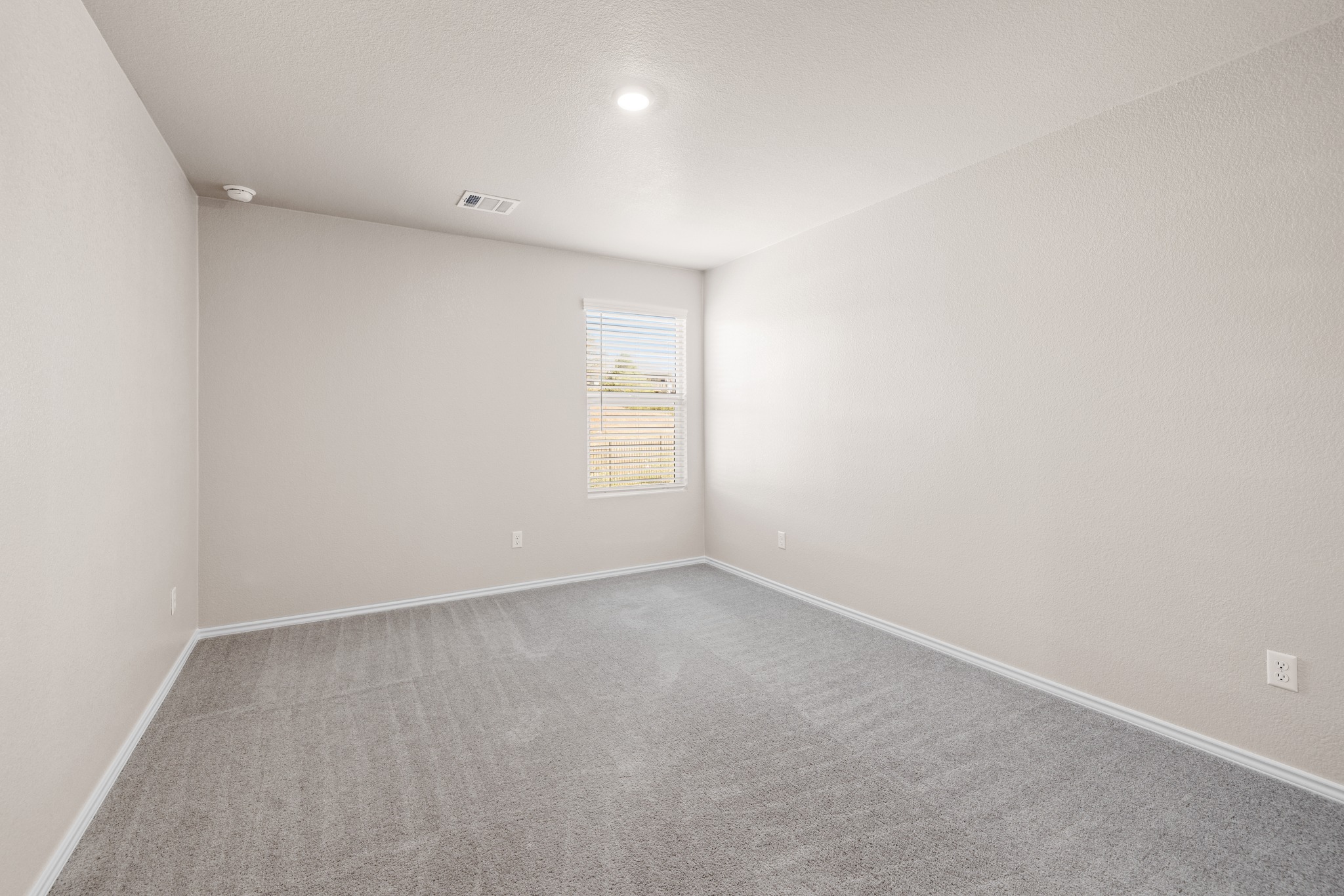 2309 Four Waters Loop Georgetown, TX 78628 - Photo 23 of 40 Empty room featuring carpet and baseboards