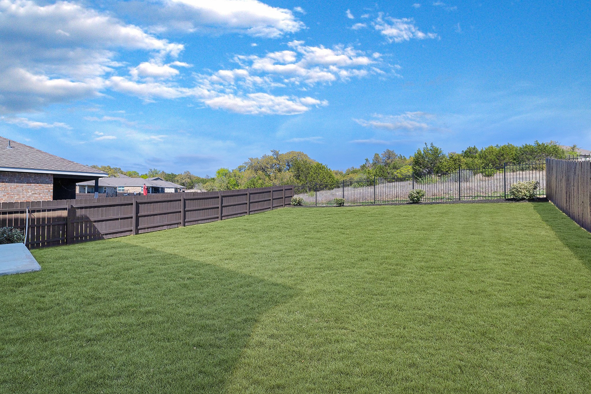 2309 Four Waters Loop Georgetown, TX 78628 - Photo 33 of 40 View of fenced backyard
