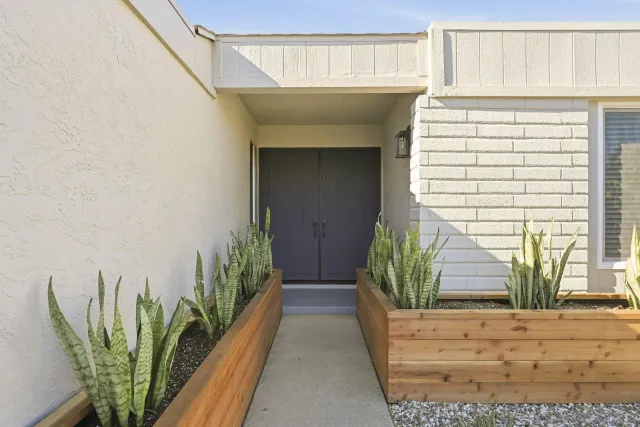 a view of entryway with wooden floor