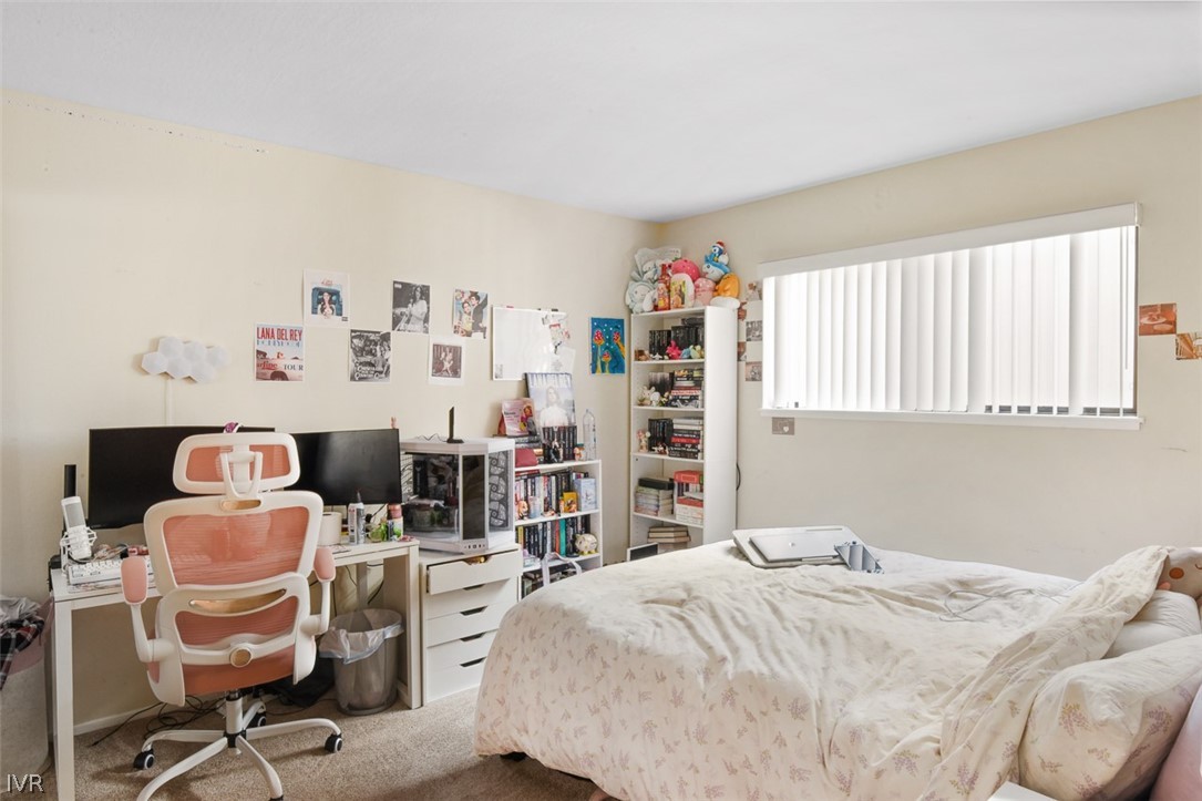 321 Ski Way Northeast, Unit 187 Incline Village, NV 89451 - Photo 11 of 18 a bedroom with a bed and a desk