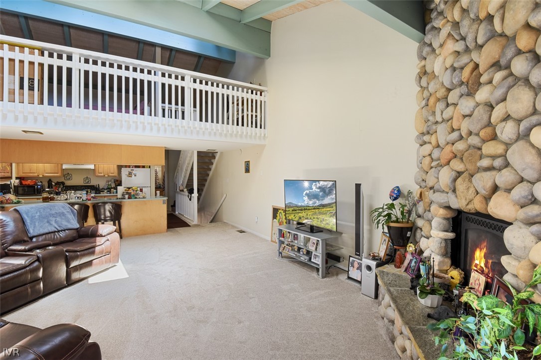 321 Ski Way Northeast, Unit 187 Incline Village, NV 89451 - Photo 13 of 18 a living room with furniture and a fireplace