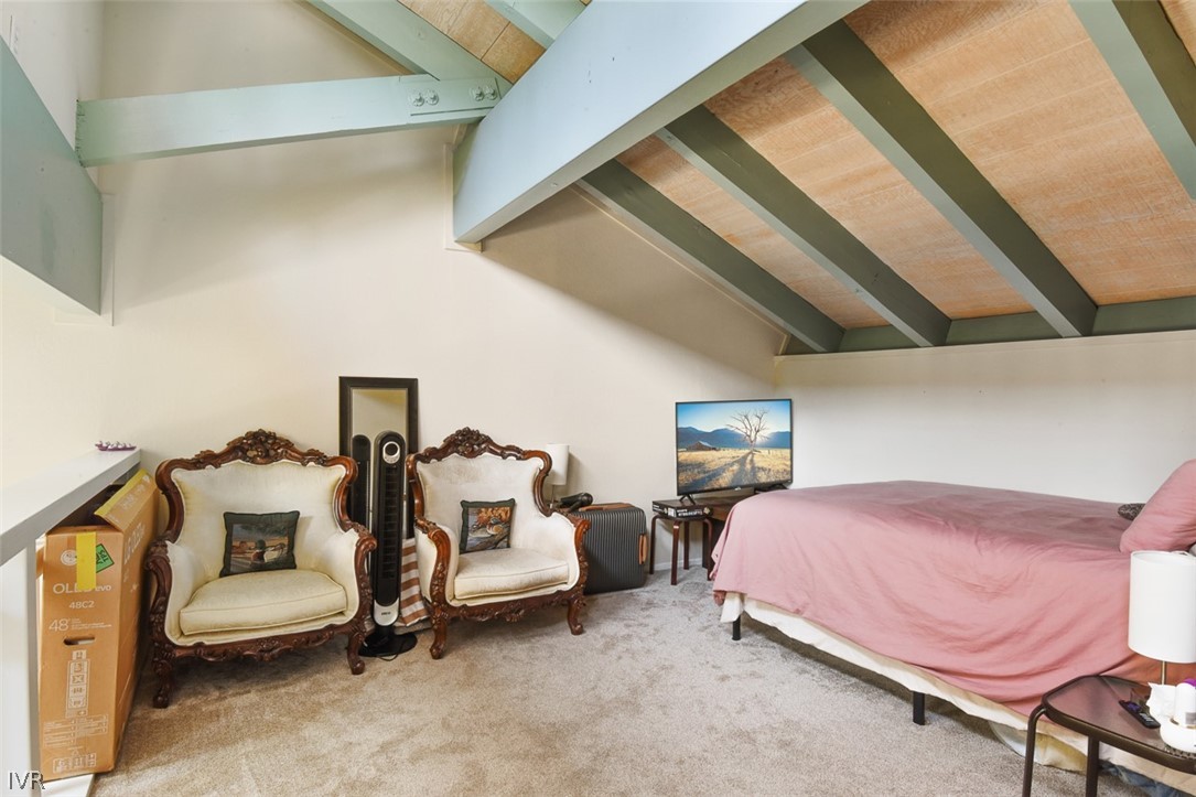 321 Ski Way Northeast, Unit 187 Incline Village, NV 89451 - Photo 18 of 18 a bedroom with a bed and a chandelier