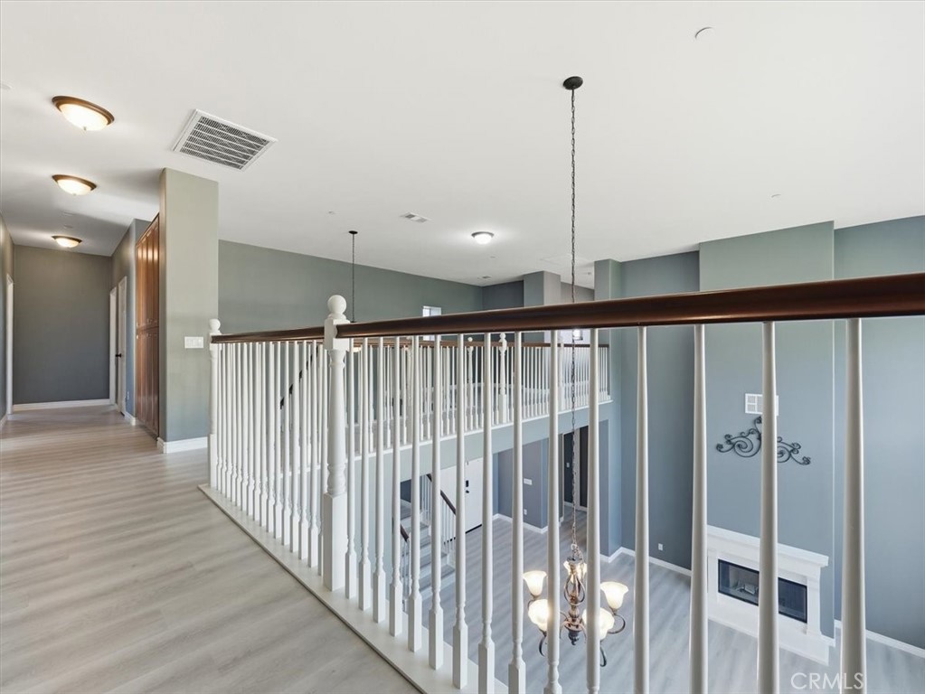 2947 Gilbert Avenue Corona, CA 92881 - Photo 20 of 60 a view of a hallway with stairs