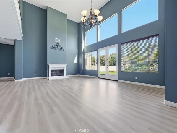 a view of a livingroom with wooden floor