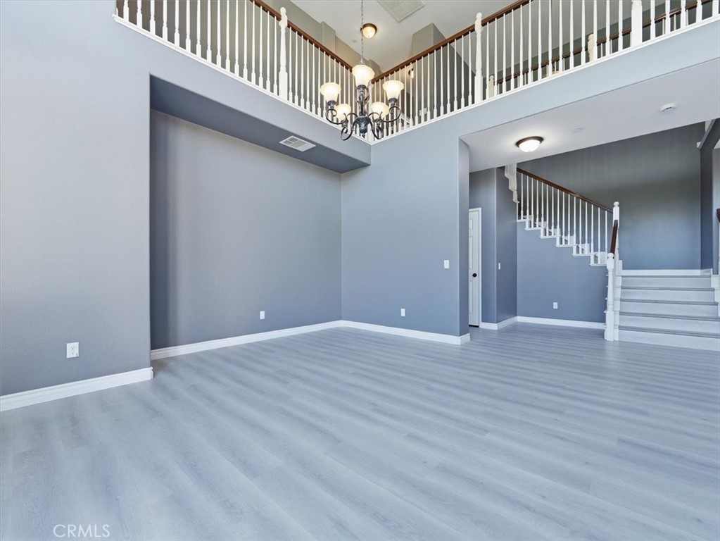2947 Gilbert Avenue Corona, CA 92881 - Photo 8 of 60 a view of an entryway with wooden floor