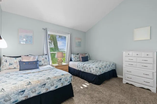 a bedroom with a bed and a closet