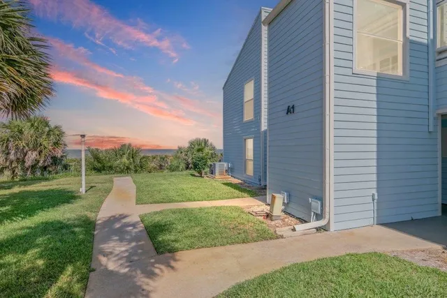 a view of a swimming pool with a lake view