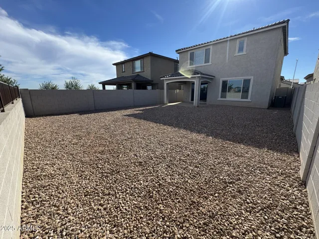 a view of an ocean & house