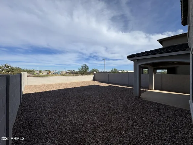 a view of a chairs and table on the terrace