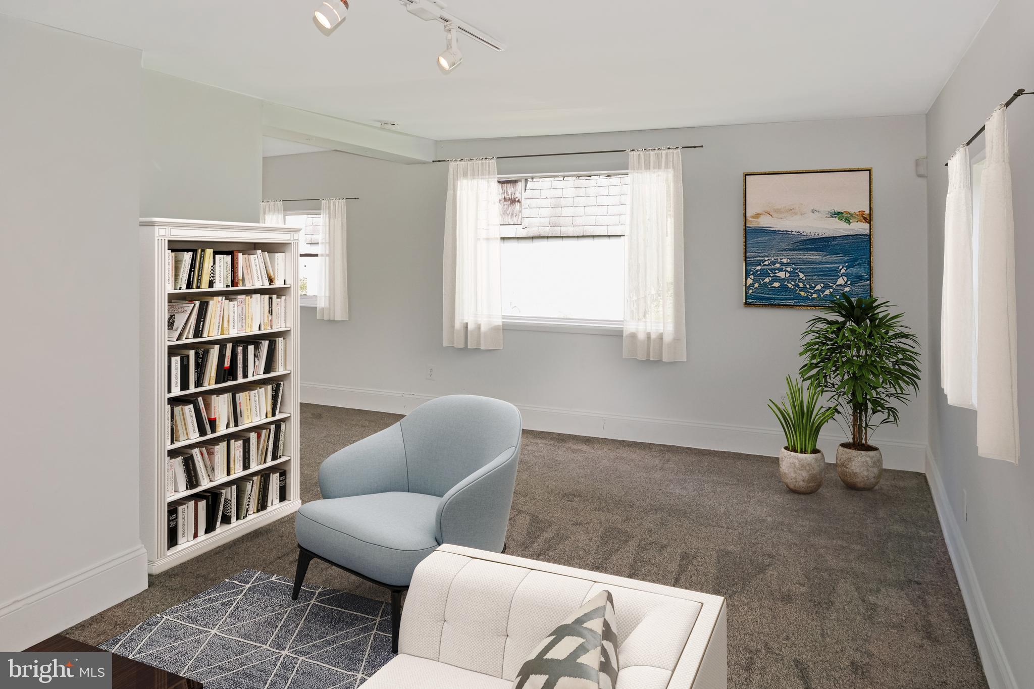 247 Matsonford Road Conshohocken, PA 19428 - Photo 4 of 9 a living room with furniture and a potted plant