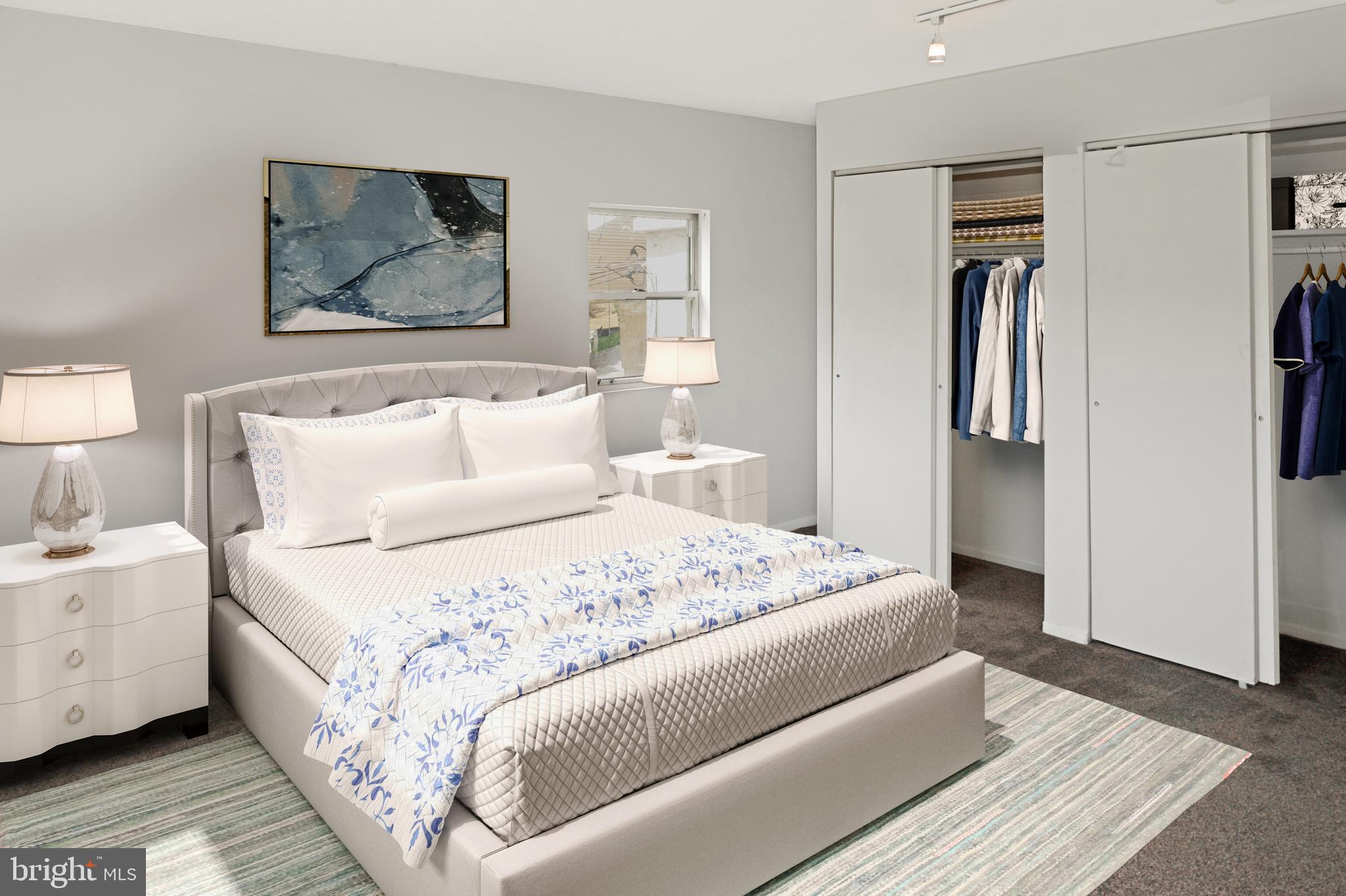 247 Matsonford Road Conshohocken, PA 19428 - Photo 8 of 9 a bedroom with a bed and a lamp