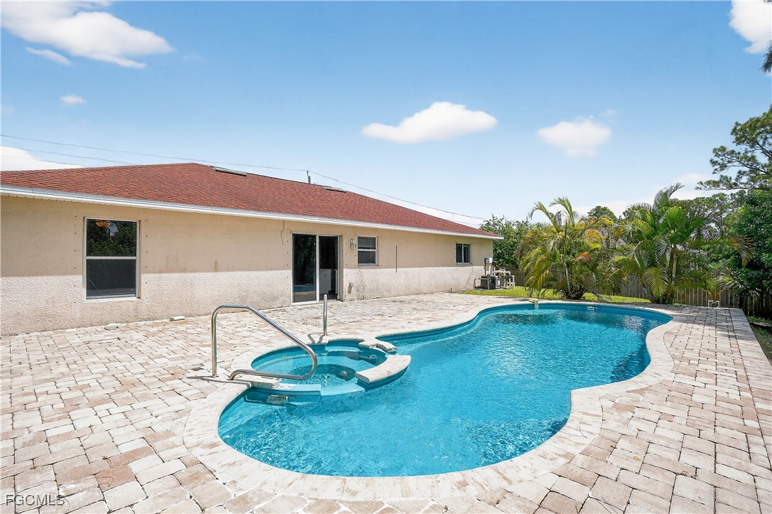 8811 Buckingham Road Fort Myers, FL 33905 - Photo 3 of 30 a view of a house with swimming pool